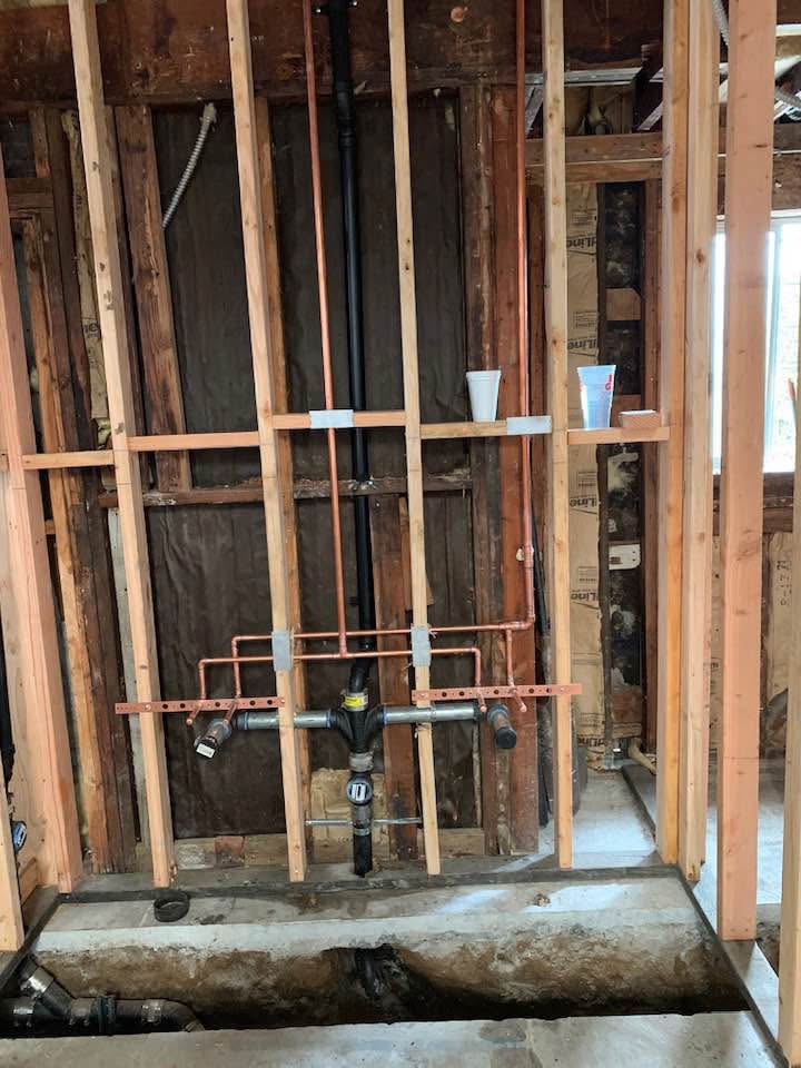 Installing new waste and water systems for a new bathroom in Studio City, CA